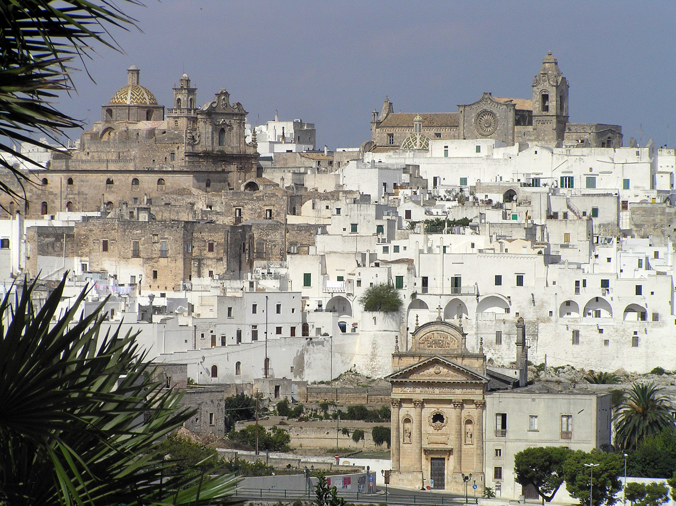 half the clothes budget travel blog explains how to travel the world and end up in gorgeous places like Ostuni