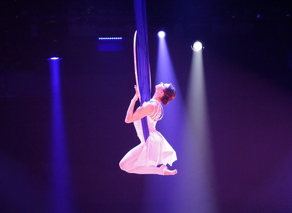 you'd get to see a female lyra circus performer like this if you had one of the best travel jobs - a roadie for her show!