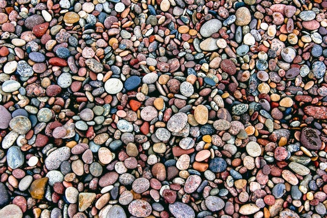 small colored pebbles, which are easy to navigate in barefoot running sandals